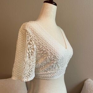 Express Ivory Lace Semi Sheer Short Bell Sleeve Bow Tie Back Crop Top Women’s S.